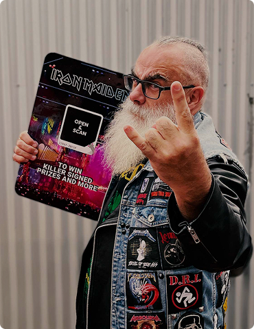 Fan holding card at concert